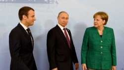 Macron-Merkel, Putin-Erdogan: il gioco delle coppie per non far scomparire l'Ue